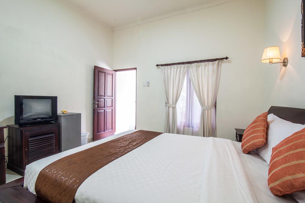 Puri Yuma Hotel 丹帕沙 外观 照片