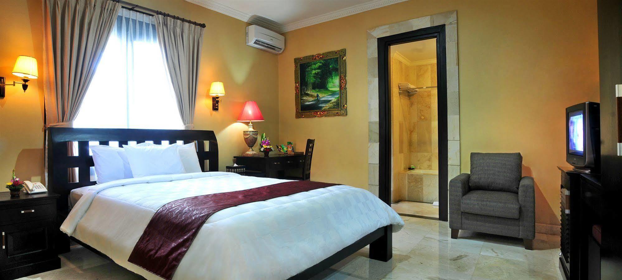 Puri Yuma Hotel 丹帕沙 外观 照片