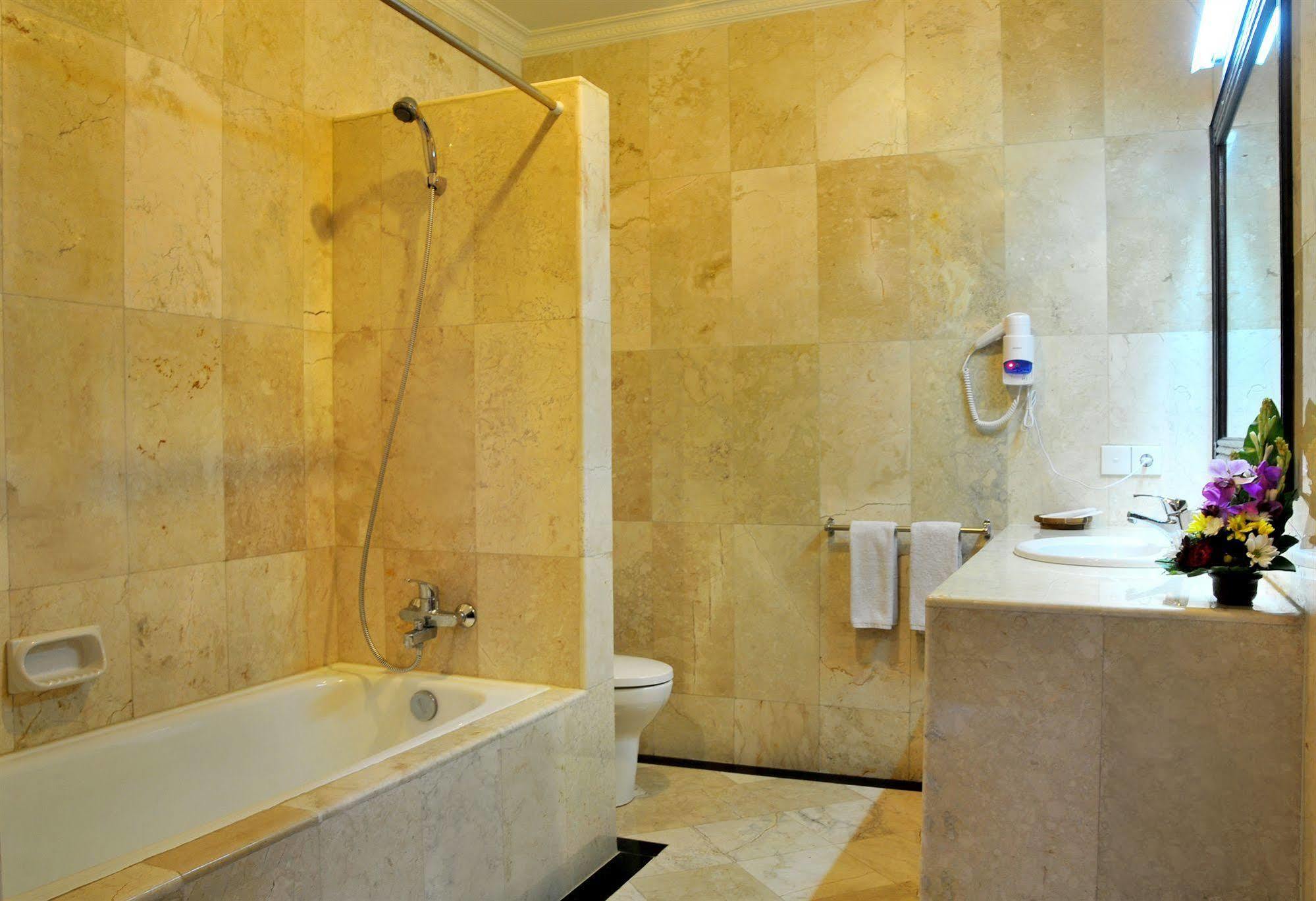 Puri Yuma Hotel 丹帕沙 外观 照片